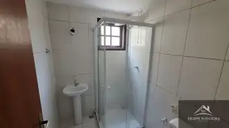 Apartamento térreo de 2 quartos sendo uma suíte, varanda e vaga em condomínio tranquilo. - FNAP20001