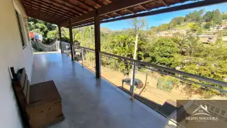 Casa com 2 quartos, sendo uma suíte, em um área total de 657,39m² em Miguel Pereira. - FNCA20012