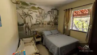 Casa com 2 quartos, sendo uma suíte, em um área total de 657,39m² em Miguel Pereira. - FNCA20012