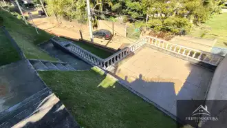 Casa com 2 quartos, sendo uma suíte, em um área total de 657,39m² em Miguel Pereira. - FNCA20012