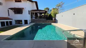 Belíssima residência de alto padrão com 6 quartos, sendo 3 suítes, sauna, área gourmet completa em um bairro nobre de Miguel Pereira. - casavillage2100