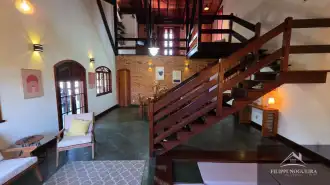 Belíssima residência de alto padrão com 6 quartos, sendo 3 suítes, sauna, área gourmet completa em um bairro nobre de Miguel Pereira. - casavillage2100