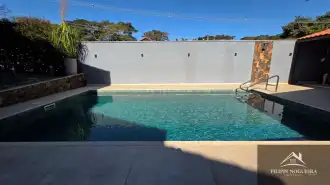 Belíssima residência de alto padrão com 6 quartos, sendo 3 suítes, sauna, área gourmet completa em um bairro nobre de Miguel Pereira. - casavillage2100