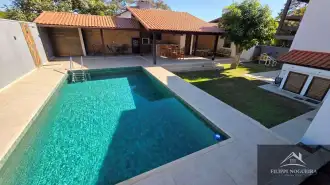 Belíssima residência de alto padrão com 6 quartos, sendo 3 suítes, sauna, área gourmet completa em um bairro nobre de Miguel Pereira. - casavillage2100