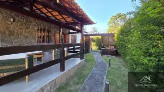 Belíssima residência de alto padrão com 6 quartos, sendo 3 suítes, sauna, área gourmet completa em um bairro nobre de Miguel Pereira. - casavillage2100