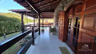 Belíssima residência de alto padrão com 6 quartos, sendo 3 suítes, sauna, área gourmet completa em um bairro nobre de Miguel Pereira. - casavillage2100