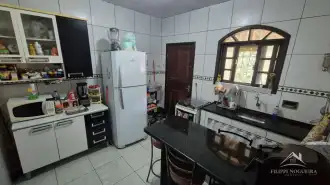 Excelente oportunidade! Casa com 2 quartos, sendo uma suíte, área gourmet e amplo terreno de 855 m², totalmente aproveitável. - FNCA20013