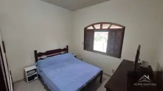 Excelente oportunidade! Casa com 2 quartos, sendo uma suíte, área gourmet e amplo terreno de 855 m², totalmente aproveitável. - FNCA20013