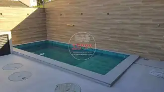Conheça Piscina com cascata do imóvel - Casa duplex nova 3 suítes no Cond. Pedra do Sol - Vargem Pequena (15000-173) - 15000-173 - 3 Piscina com cascata - 3