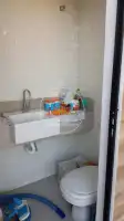 Conheça Banheiro para piscina do imóvel - Casa duplex nova 3 suítes no Cond. Pedra do Sol - Vargem Pequena (15000-173) - 15000-173 - 5 Banheiro para piscina - 5
